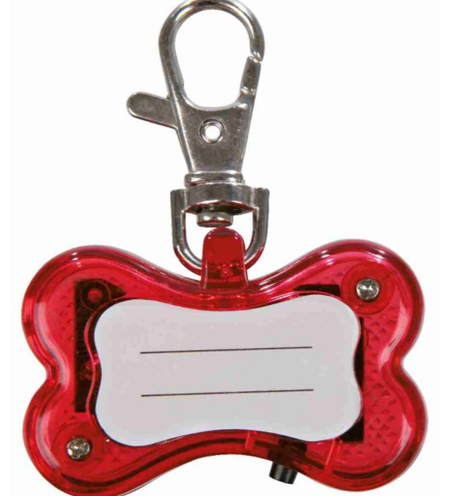 TRIXIE Svítící přívěsek červená kost pro psy 4,5 x 3 cm (RP 2,10 Kč)
