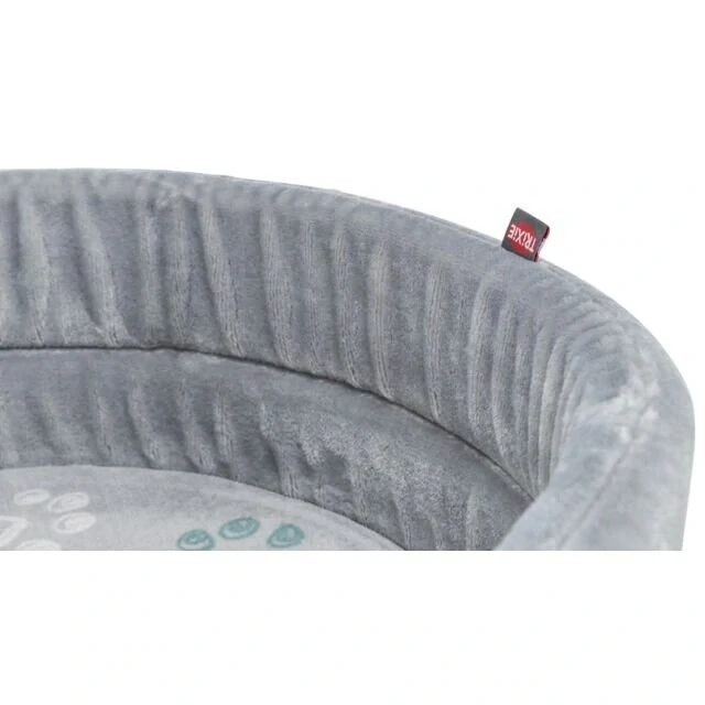 TRIXIE Pelech JIMMY Soft oválný, měkký plyš, světlešedý s tlapkami 65 x 55cm