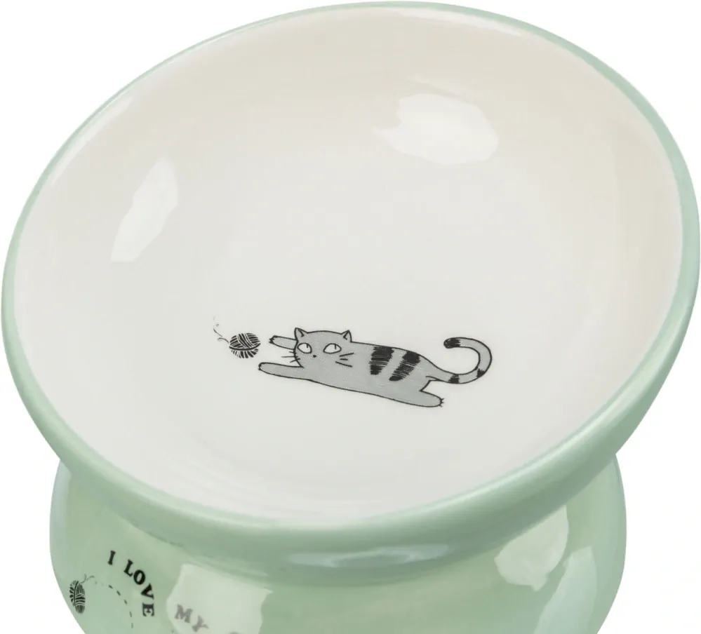 TRIXIE Keramická miska vyvýšená s motivem kočky, ergonomický tvar, 0,15 l / 13 cm, šalvěj/bílá