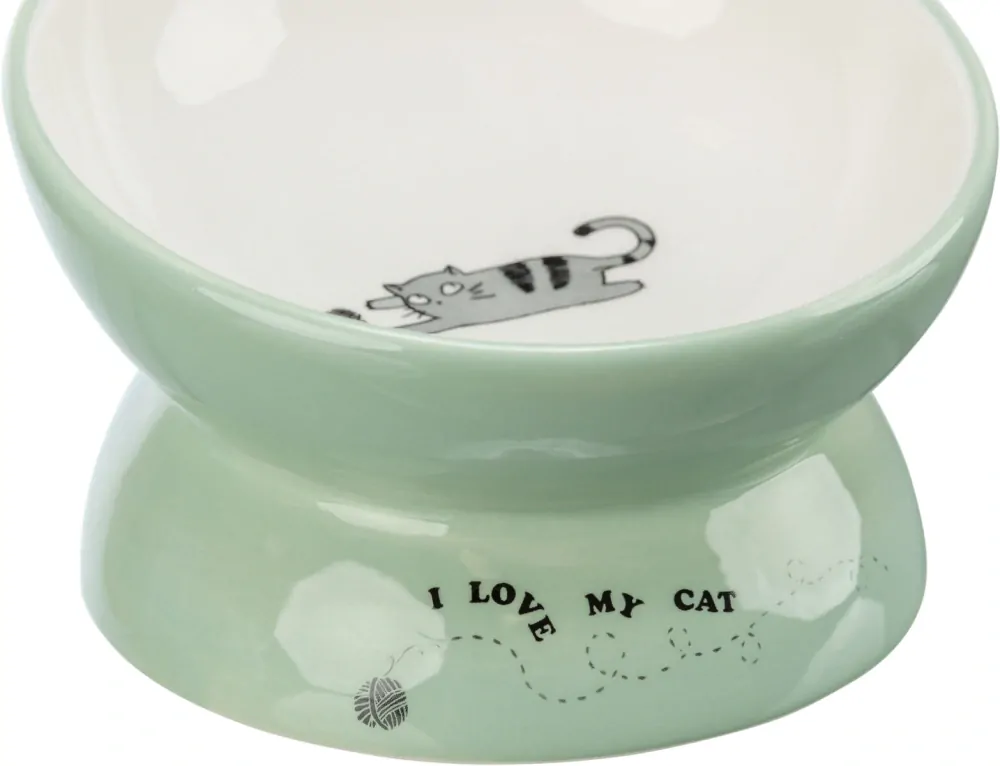 TRIXIE Keramická miska vyvýšená s motivem kočky, ergonomický tvar, 0,15 l / 13 cm, šalvěj/bílá